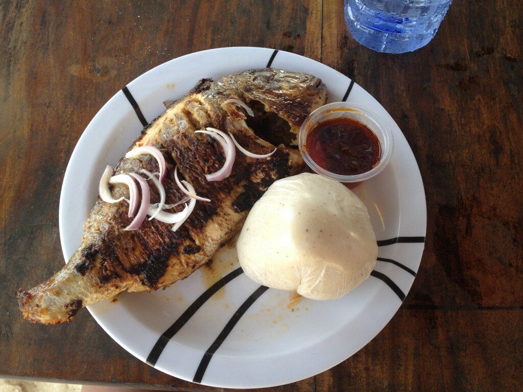 grilled tilapia and banku from bojo beach in ghana